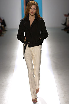 black fitted jacket with white tailored pants