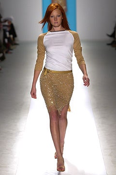 white beige fitted top with gold beaded skirt