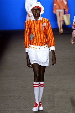 orange striped shirt with white skirt