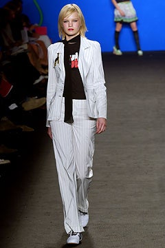 tailored white suit with black t-shirt