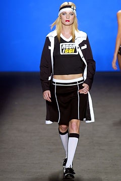 black fitted top and skirt with jacket