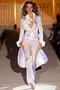 white silk blouse with purple pants