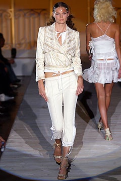 fitted white silk jacket and pants