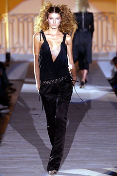 black silk fitted top and relaxed pants