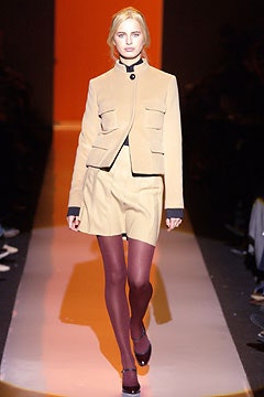 beige fitted jacket and shorts