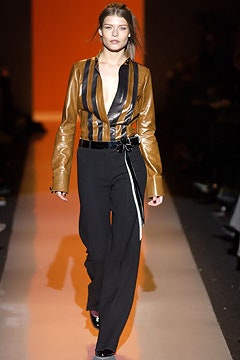 brown leather fitted blazer with black tailored pants