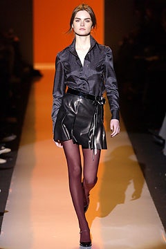 black silk shirt and leather mini skirt