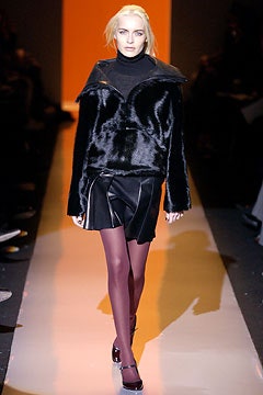 black faux-fur jacket with mini skirt