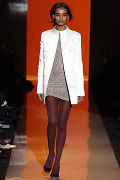 white coat with brown mini dress