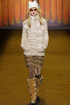 beige relaxed sweater with mini skirt