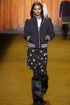 black fitted jacket and skirt