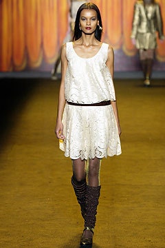white lace mini dress with brown boots
