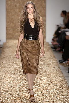 black sleeveless top with brown pencil skirt