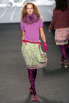 pink fitted top with green flared skirt