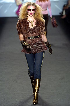 brown fur top with blue jeans