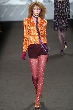 orange silk long-sleeve collared fitted ruffled blouse