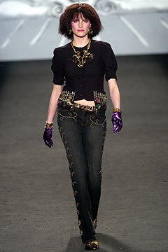 black fitted jacket with blue jeans