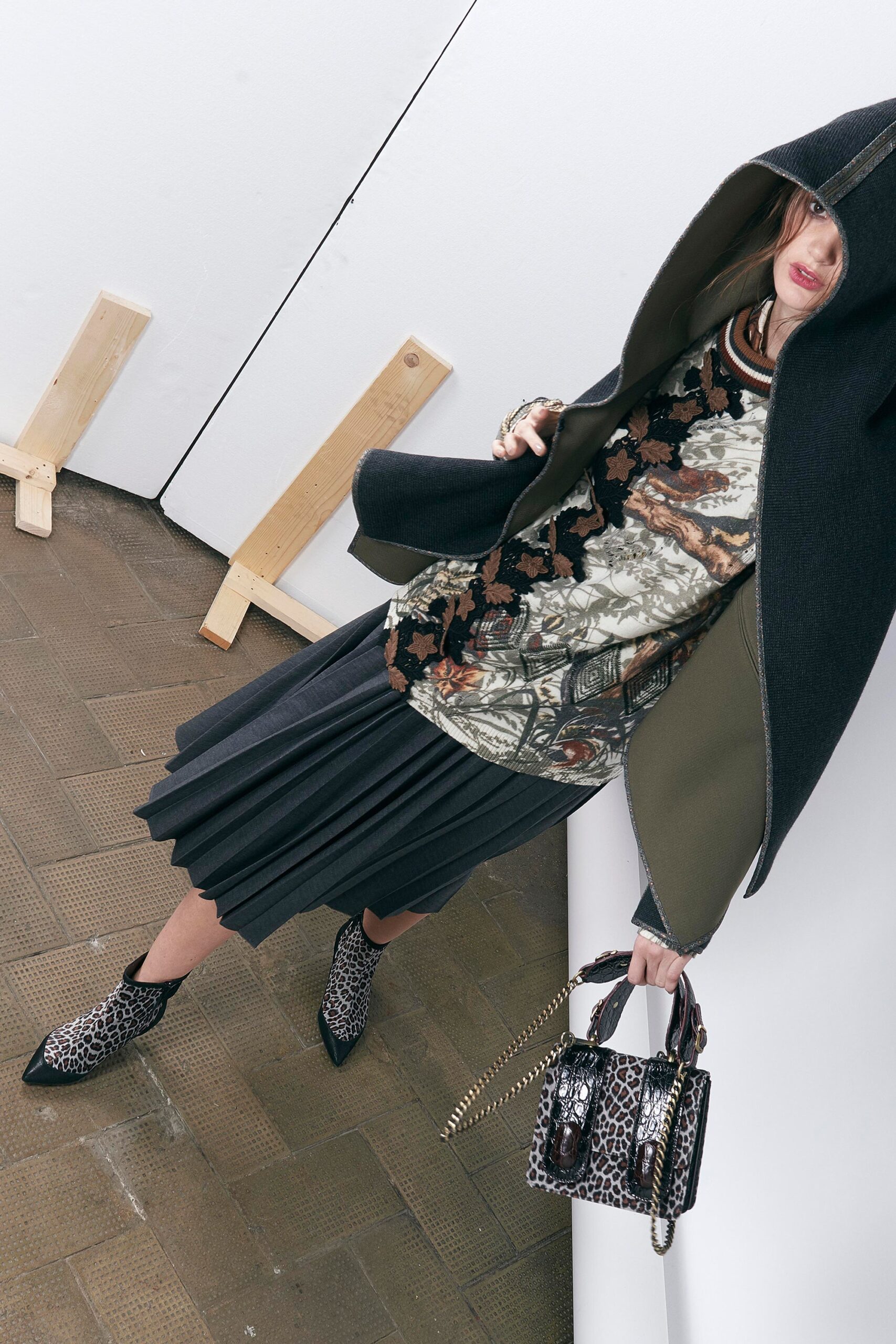 black wool coat with printed top