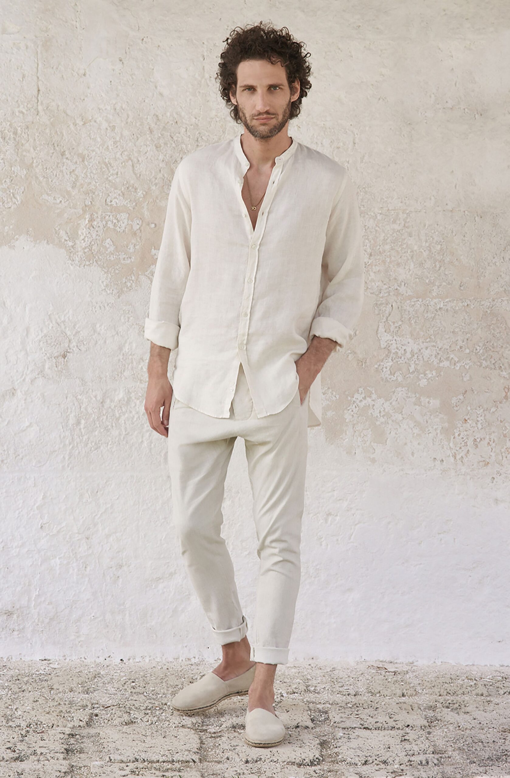 white linen long-sleeve collared relaxed shirt