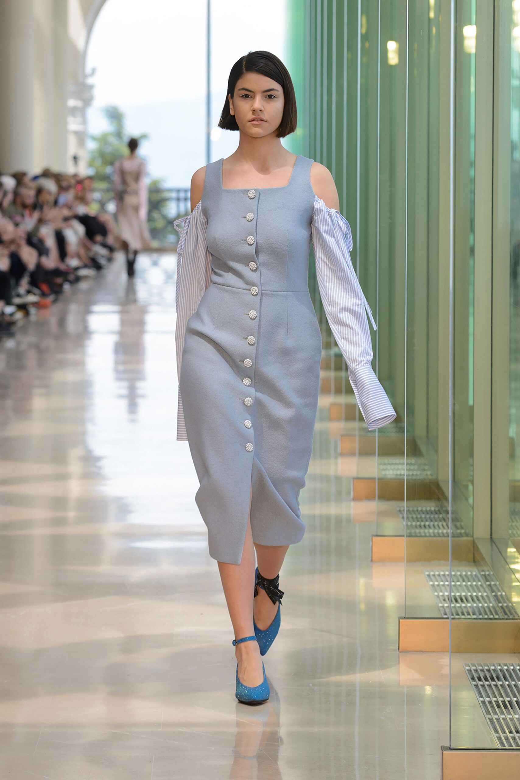 blue fitted midi dress with striped blouse