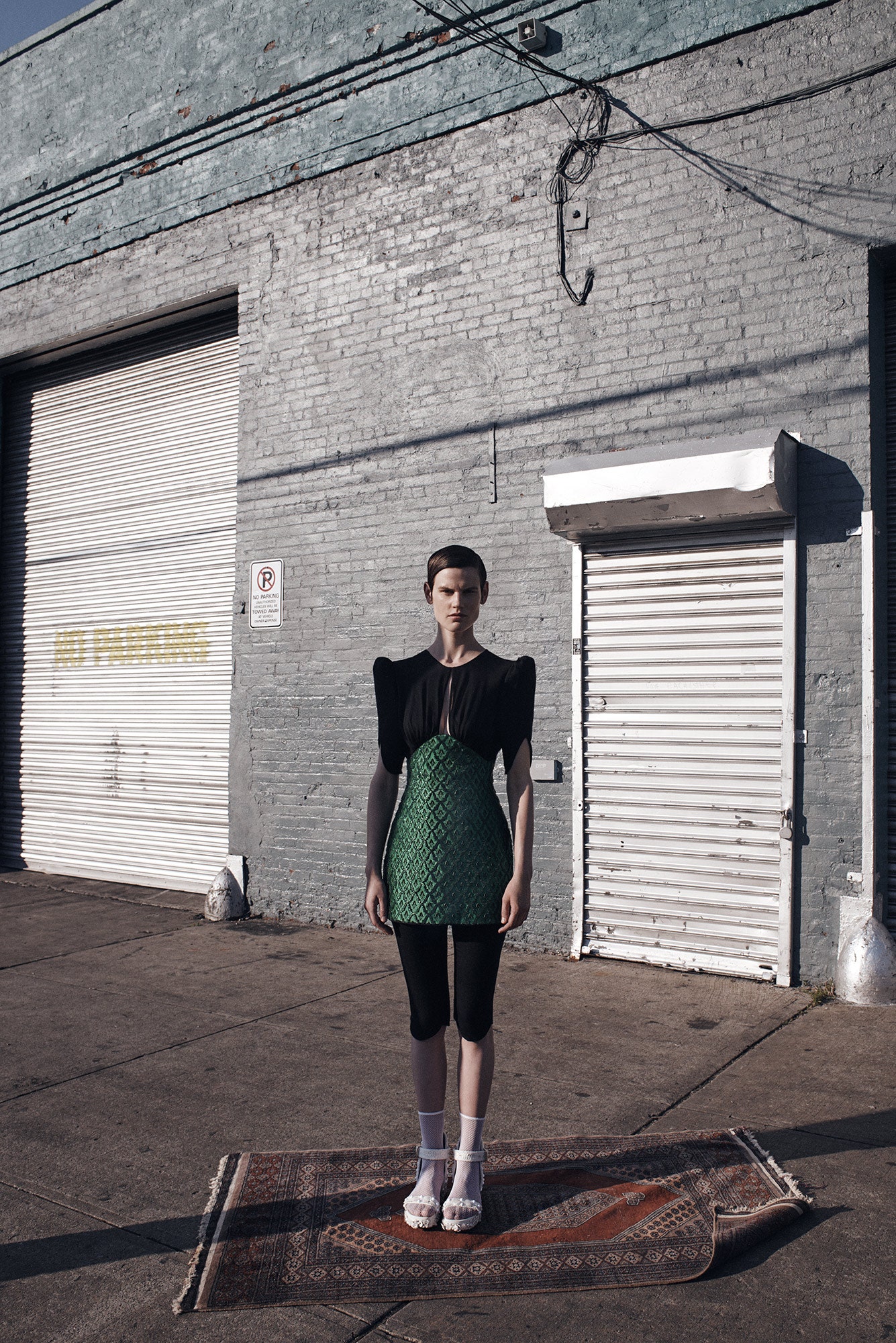green cotton sleeveless v-neck fitted pleated mini dress
