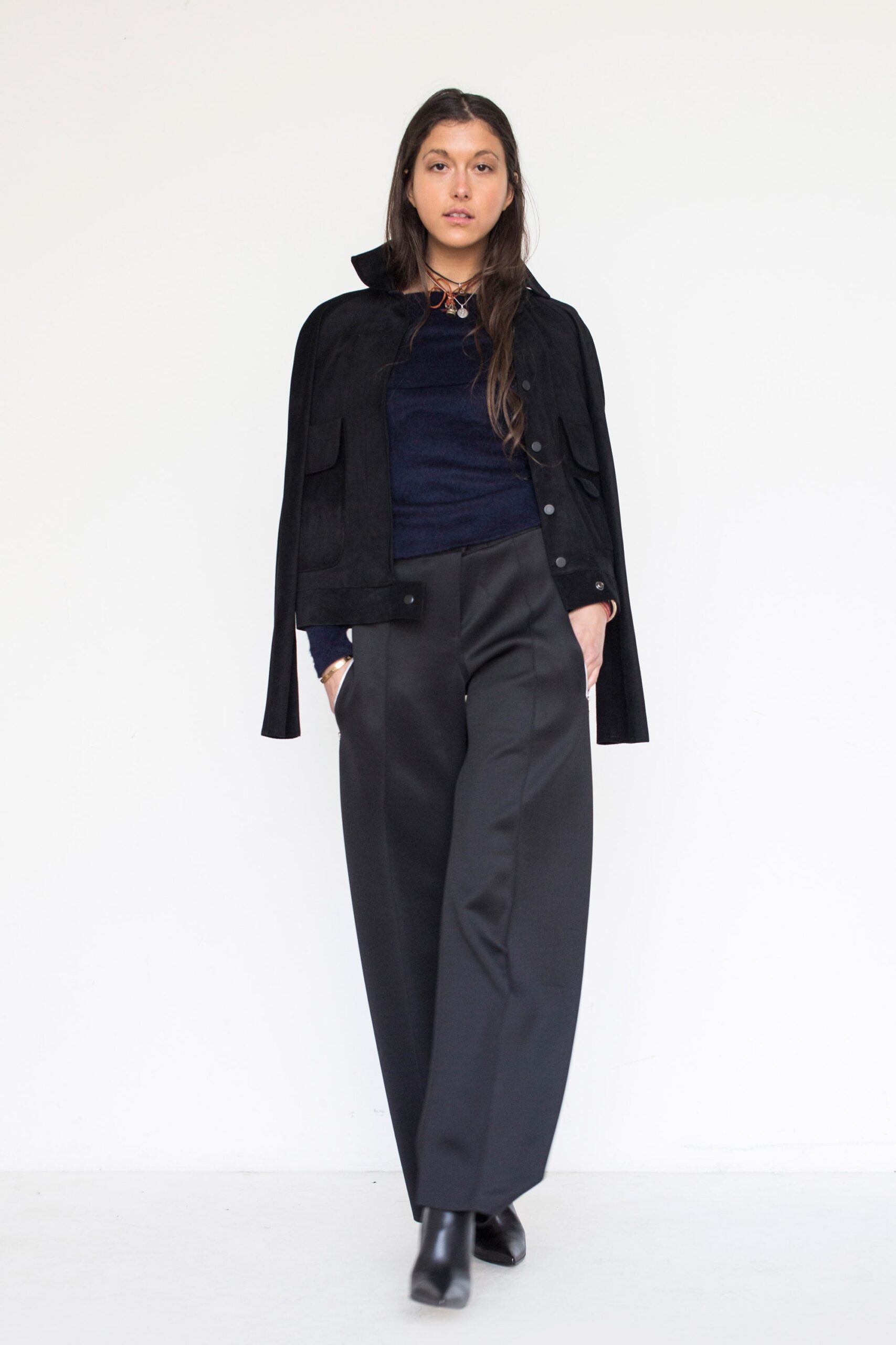 black suede jacket with navy top