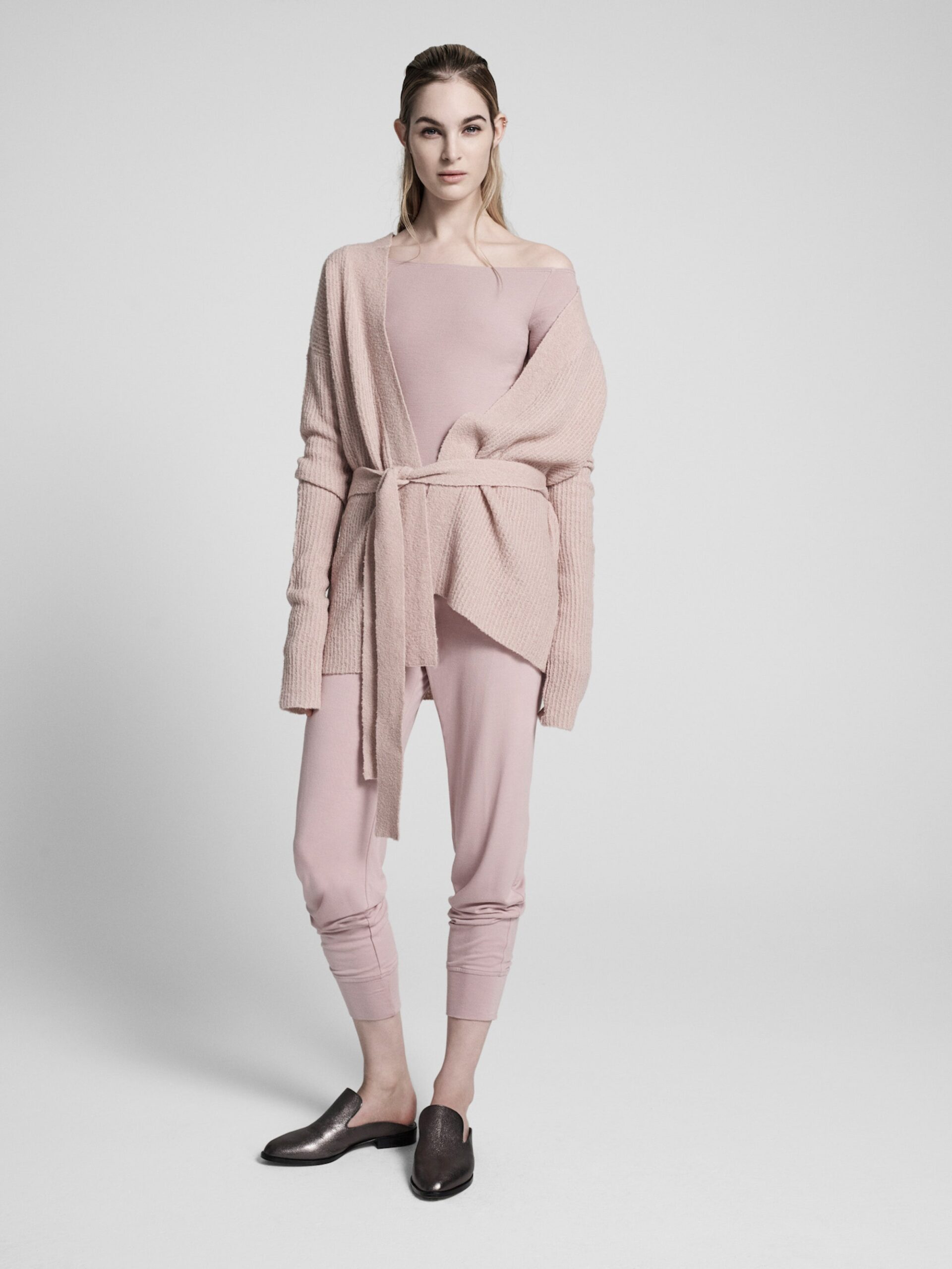 pink knit cardigan with jumpsuit