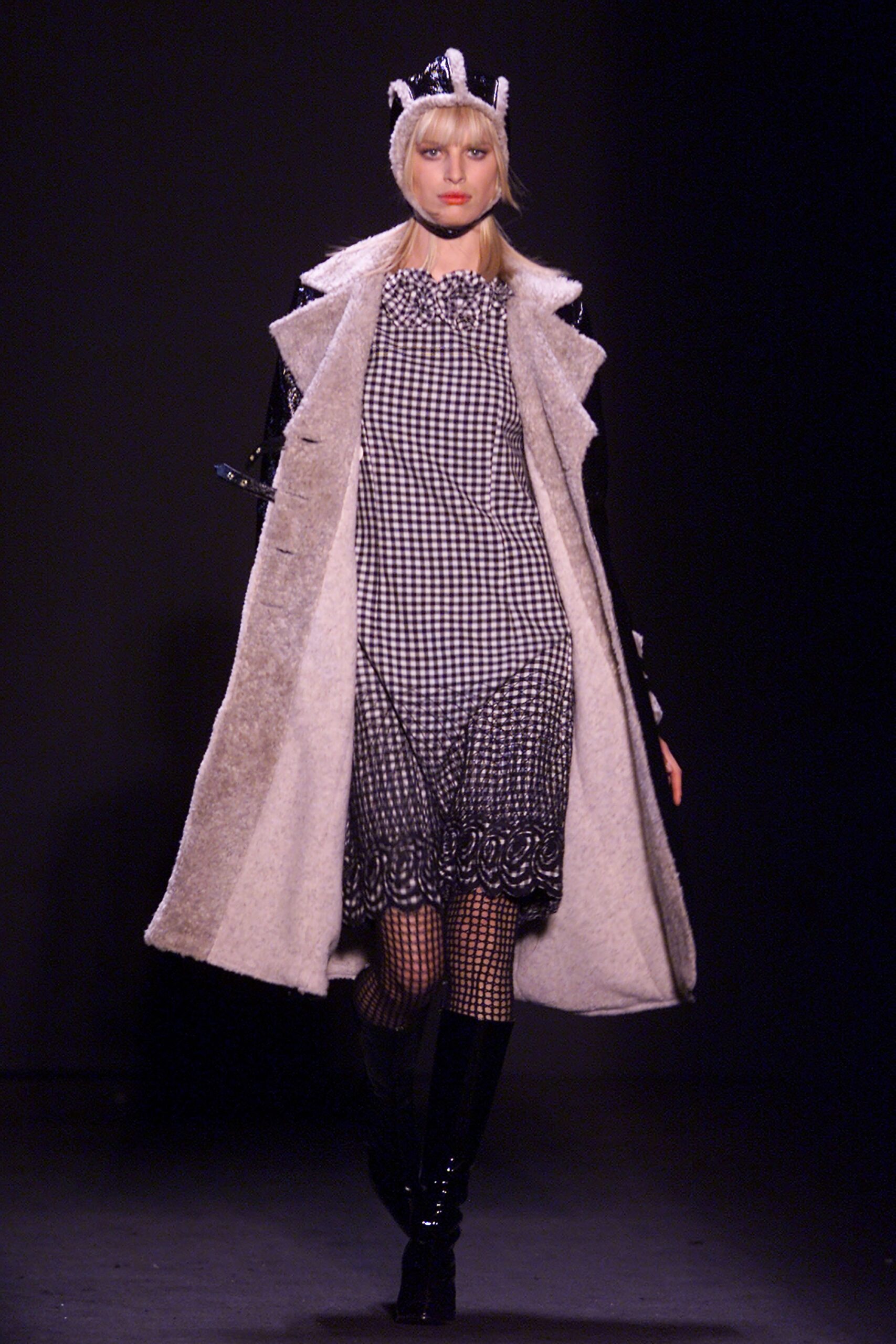 black and white checked midi dress with beige coat