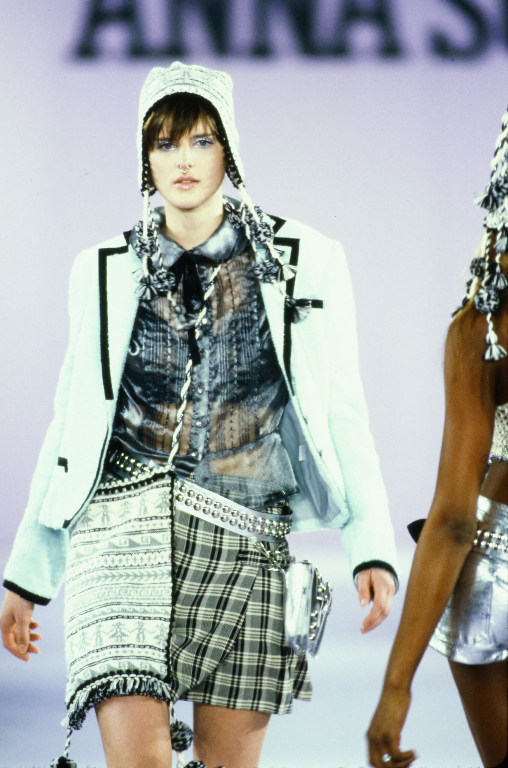 white fitted jacket with sheer blue shirt