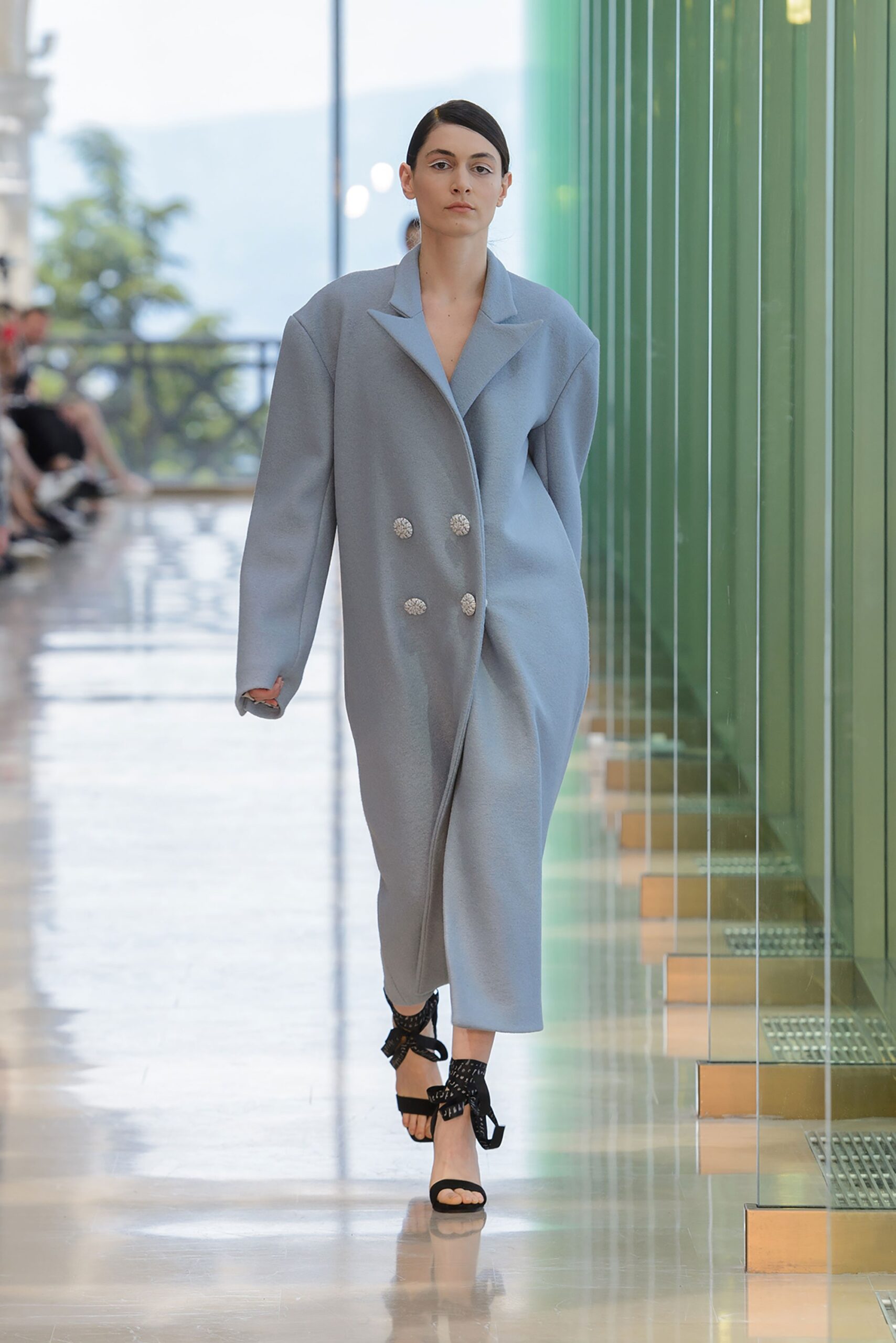 blue oversized wool coat with black shoes