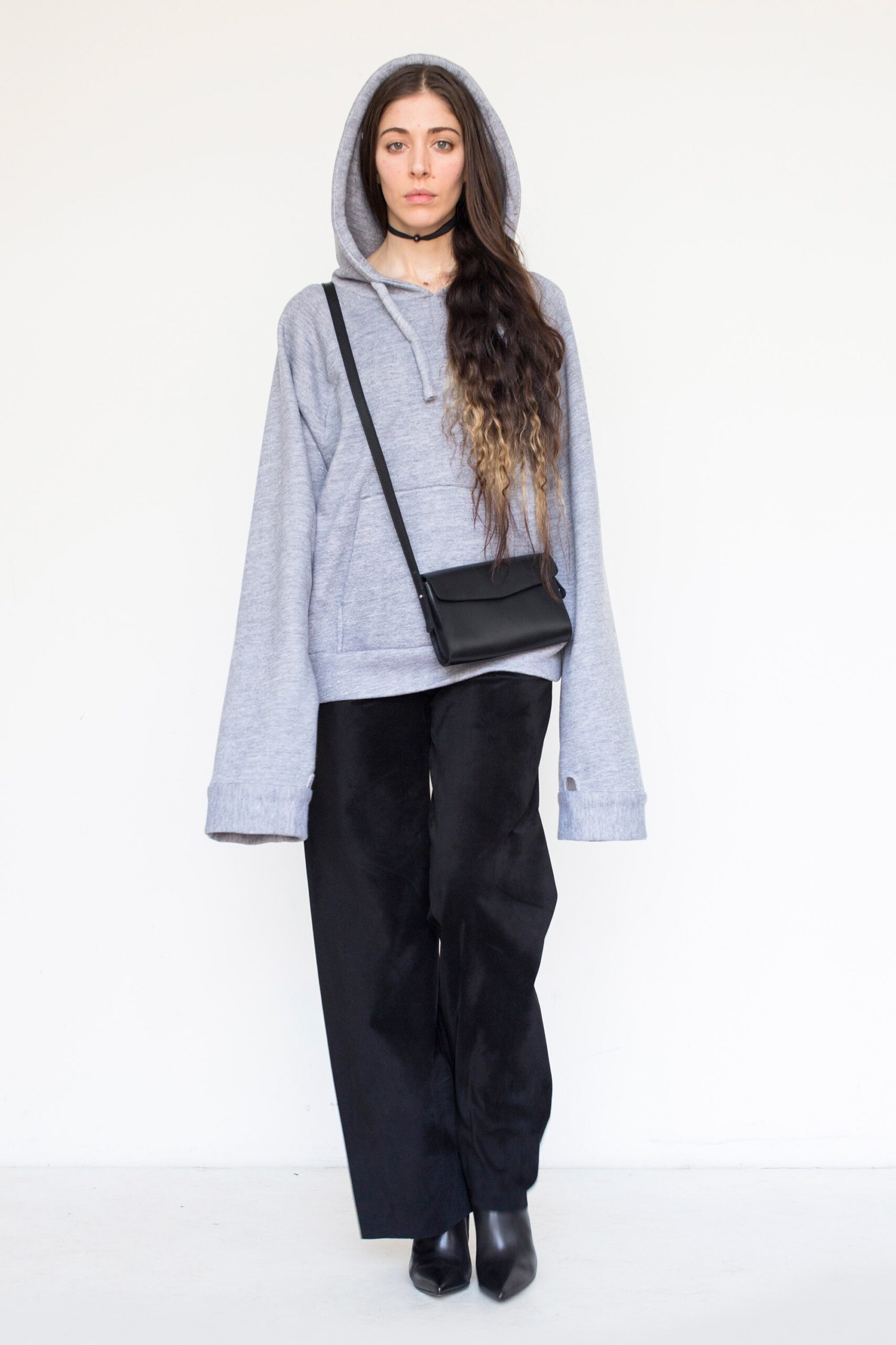 gray oversized hoodie with black pants