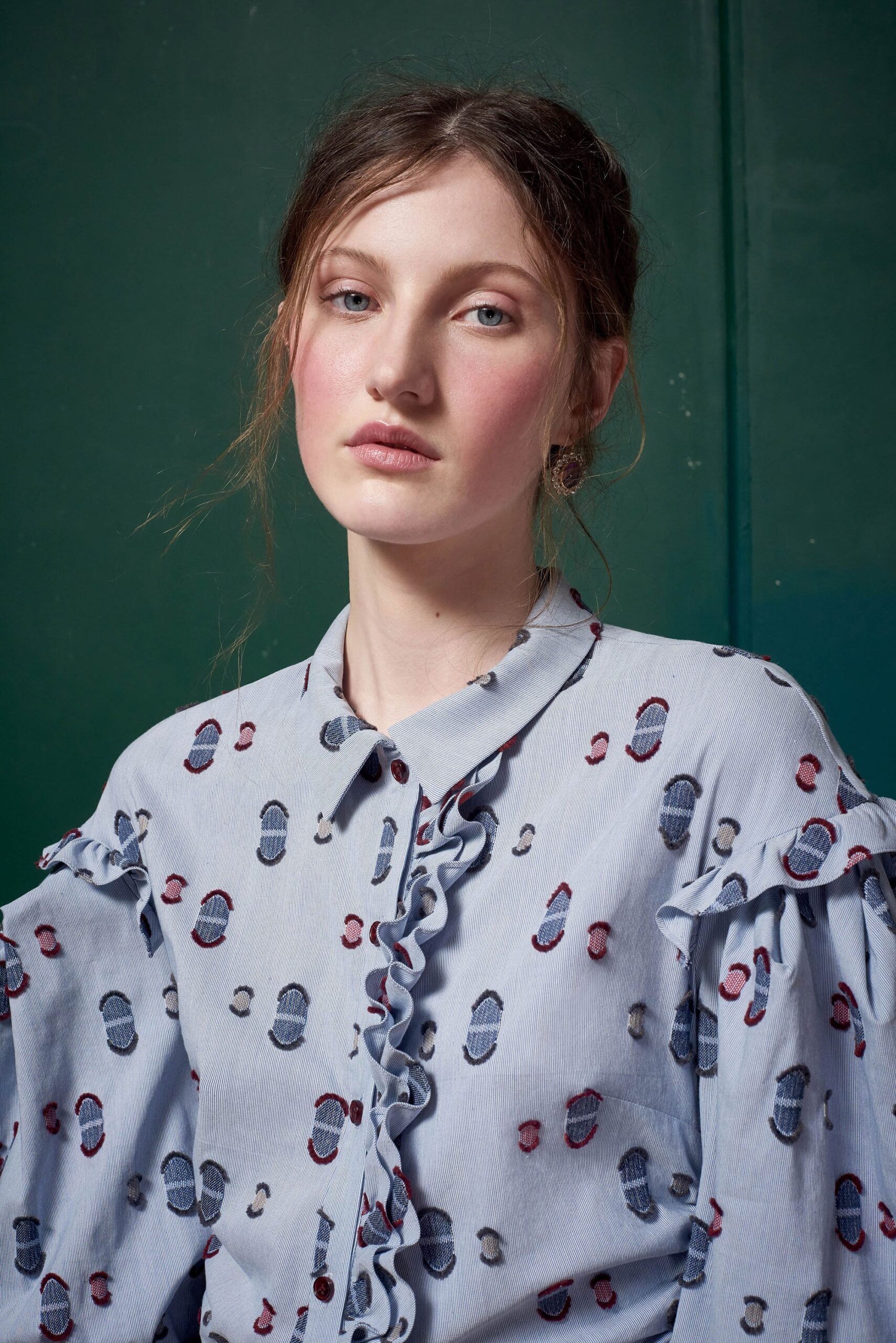 blue and white printed ruffled blouse