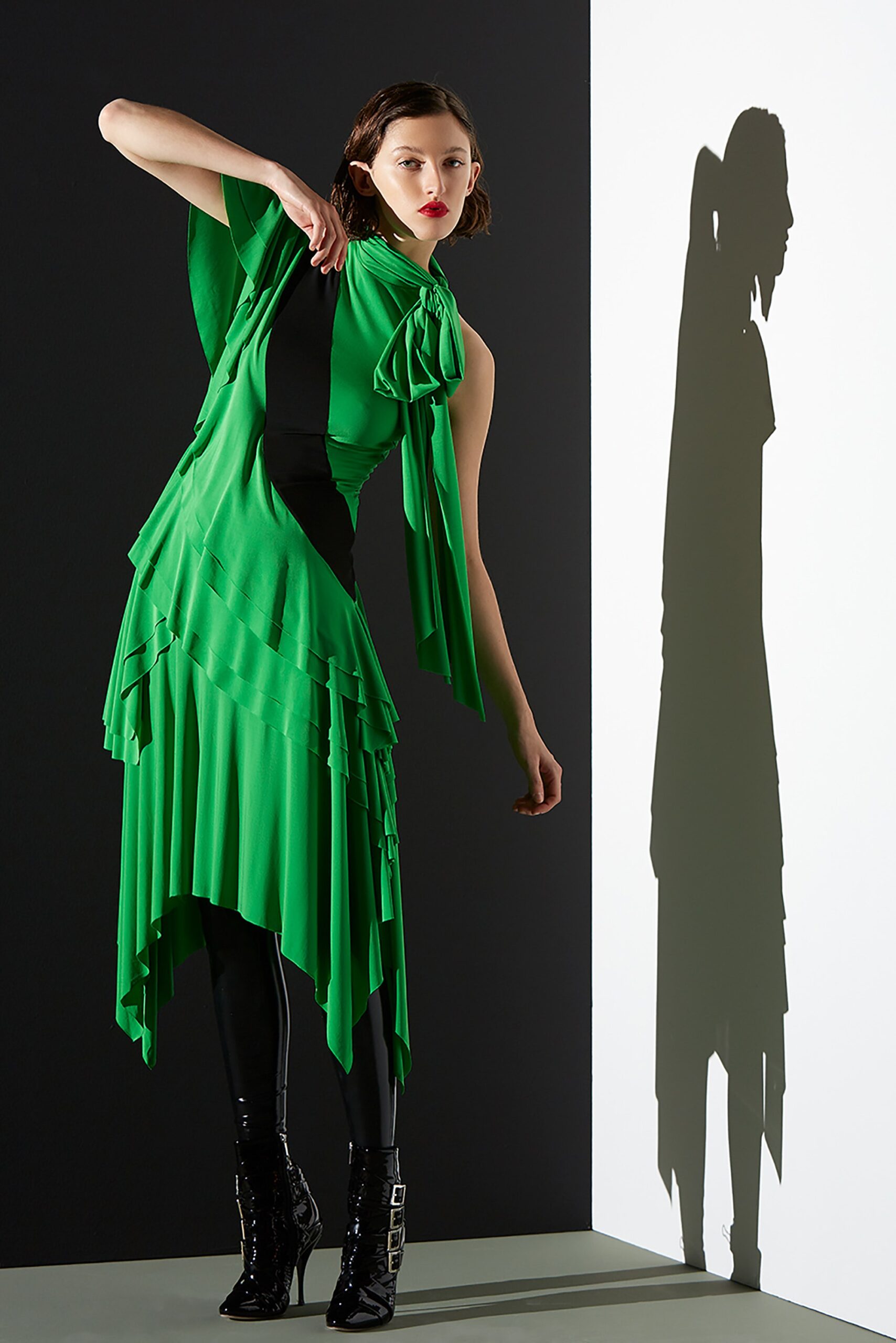 green silk sleeveless high-neck fitted pleated draped dress