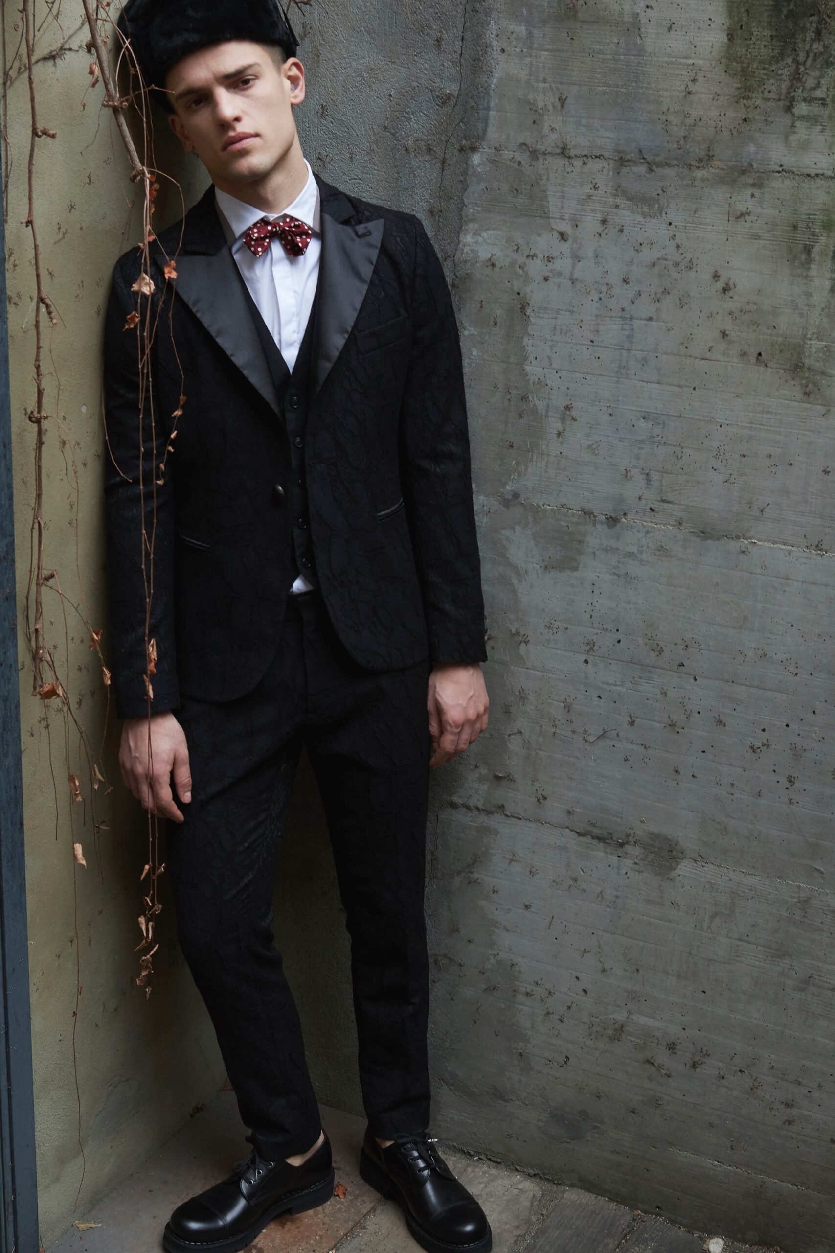 black tailored suit with white shirt