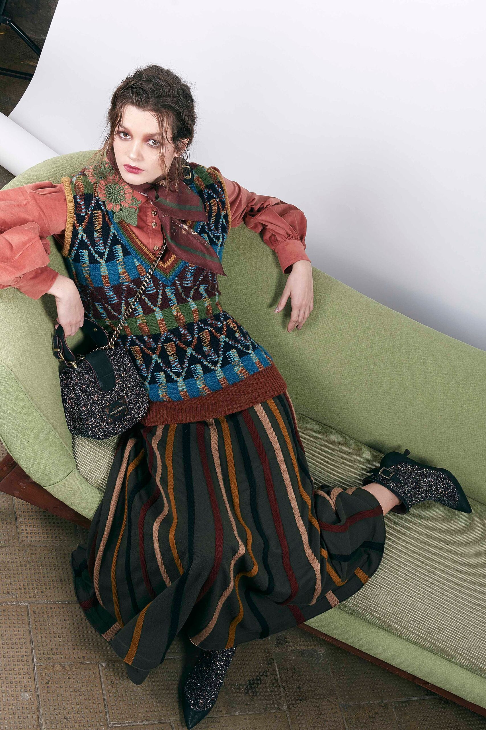 embroidered wool vest with pleated skirt