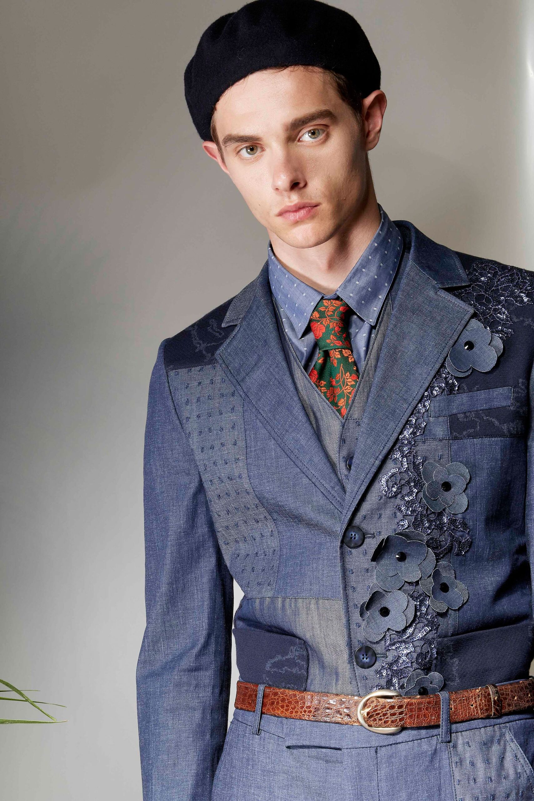 blue tailored suit with embroidered details
