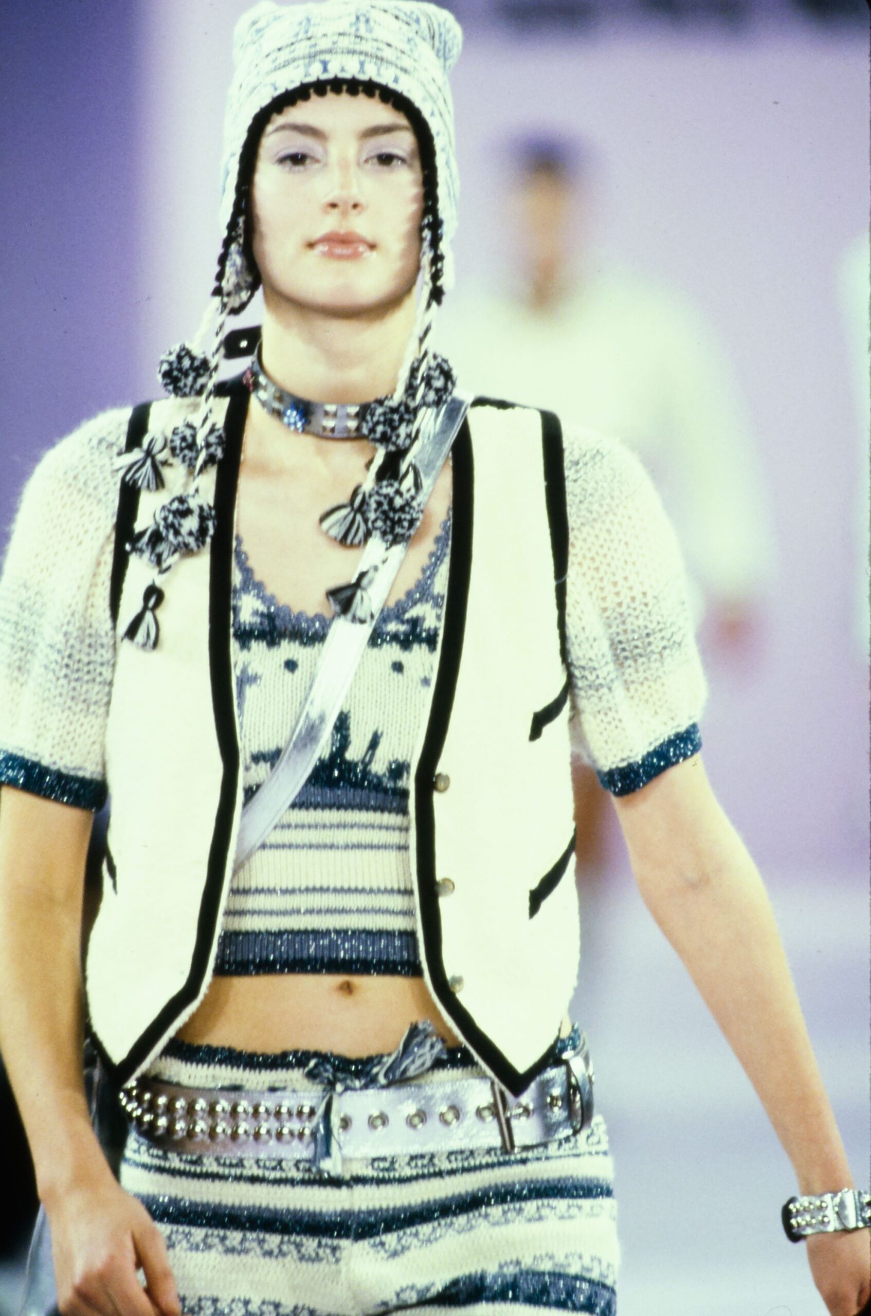 white fitted vest with blue striped top