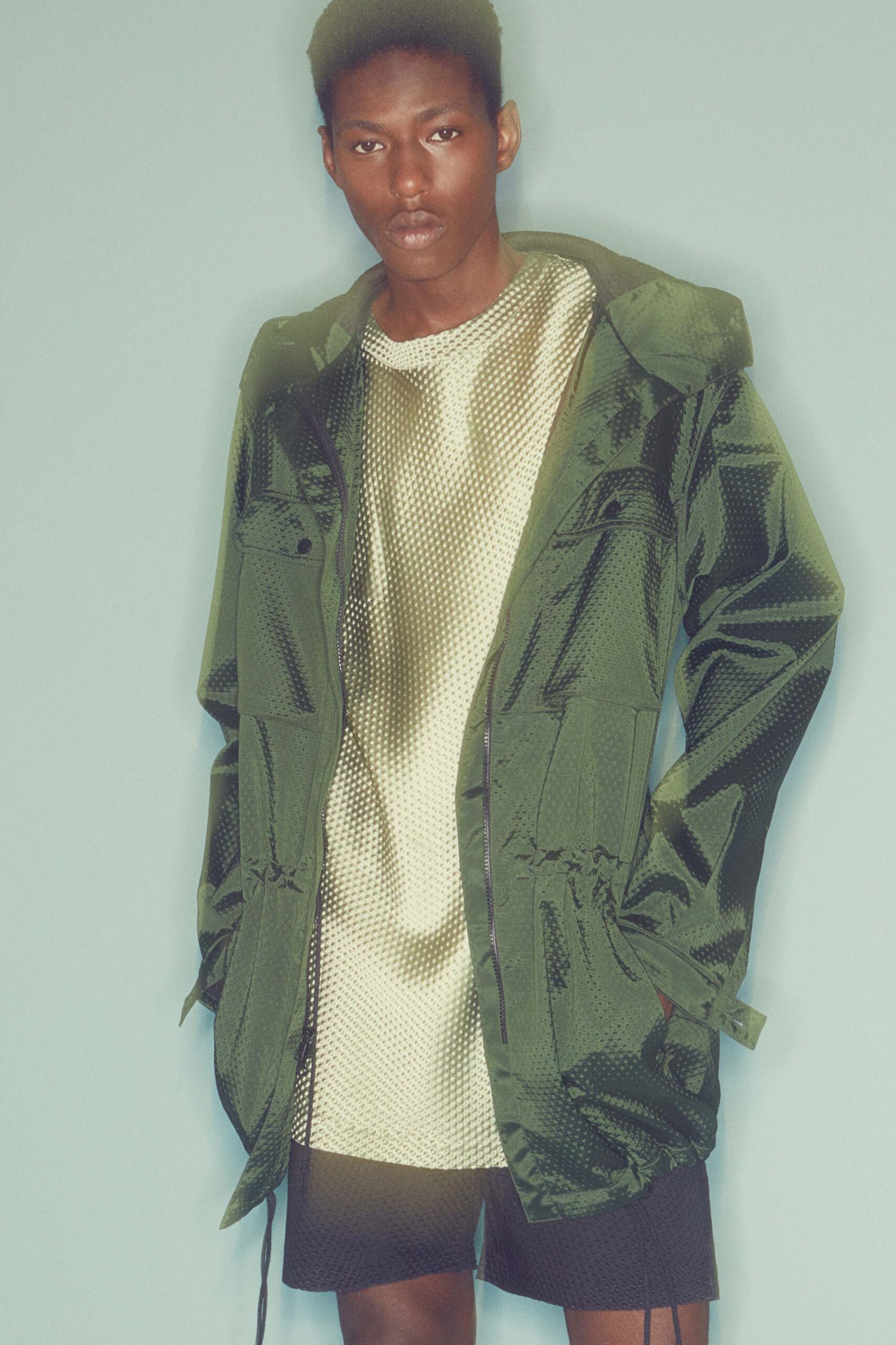 green vinyl long-sleeve hooded relaxed zippered pockets jacket