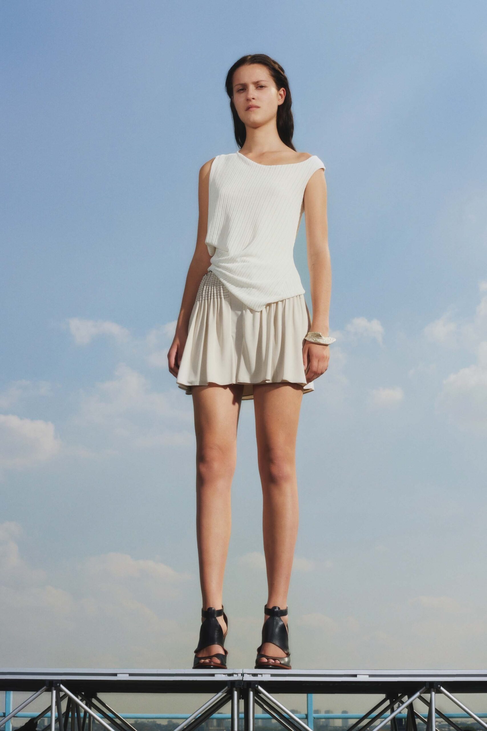 white fitted top beige mini skirt