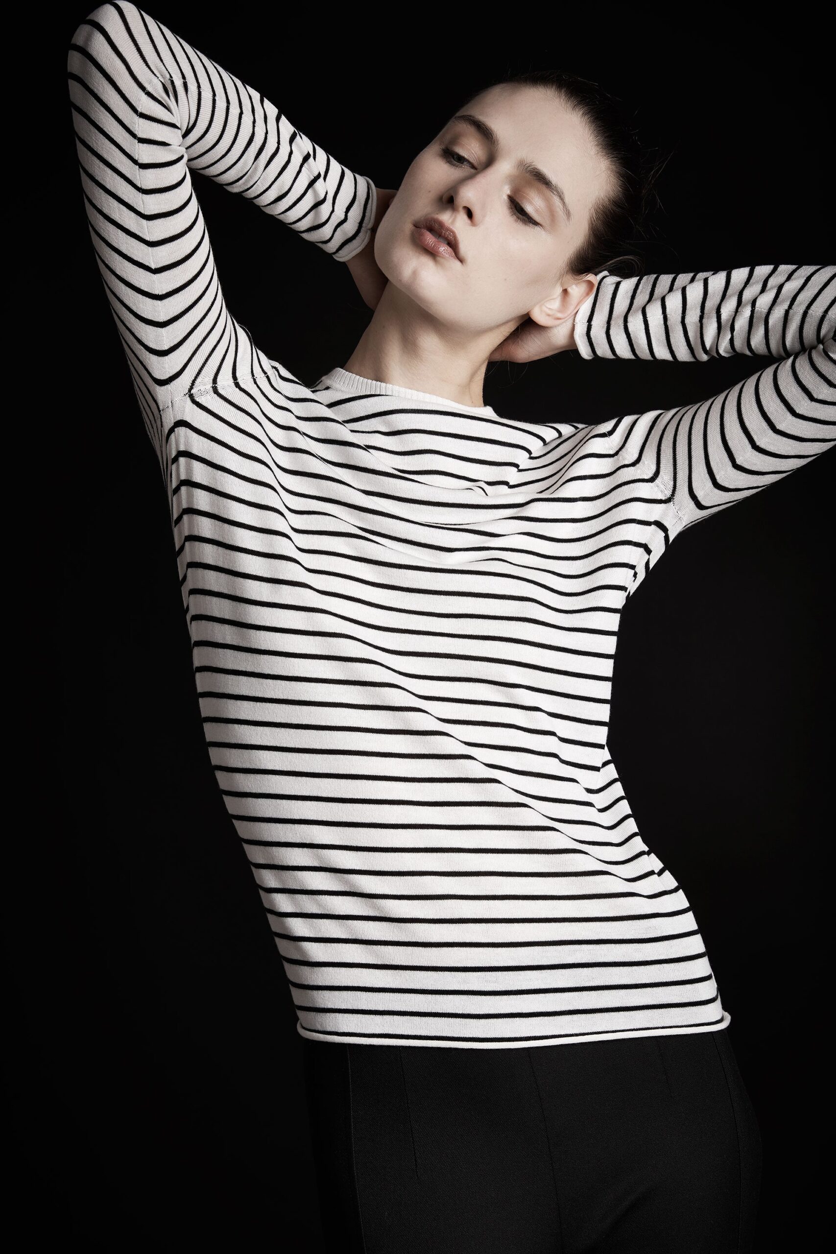 striped fitted top and black pants
