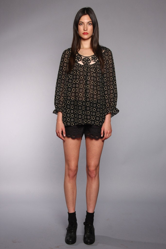 black lace shorts with sheer blouse