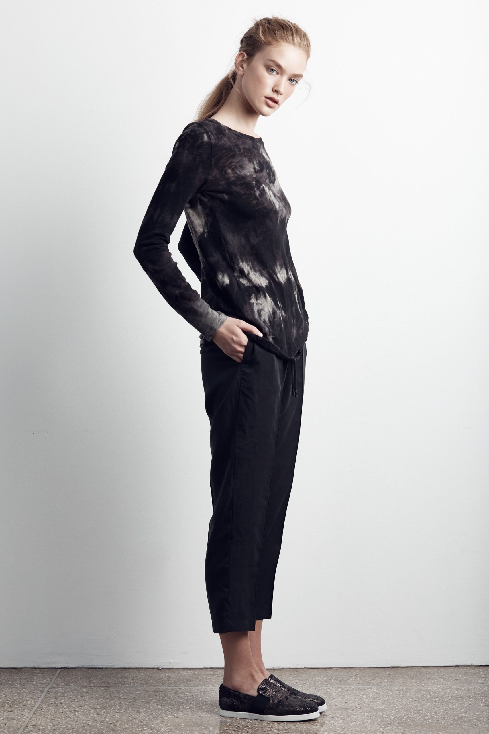 relaxed black and white top with tailored pants