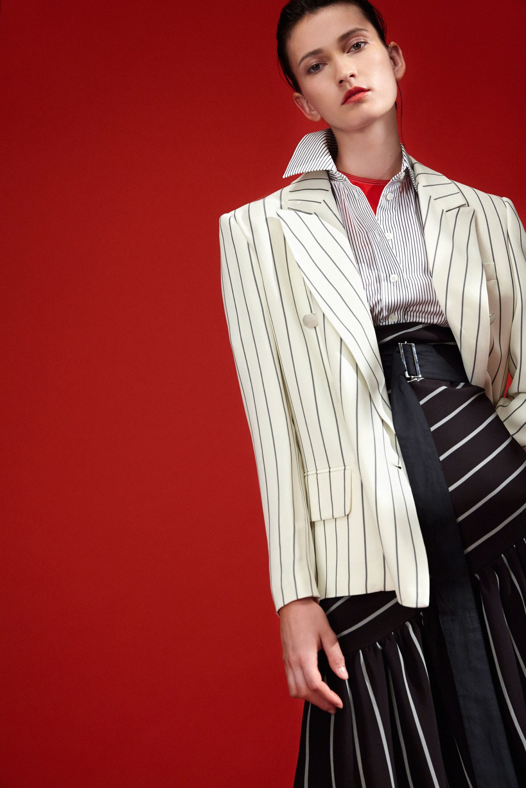 striped blazer and pleated skirt