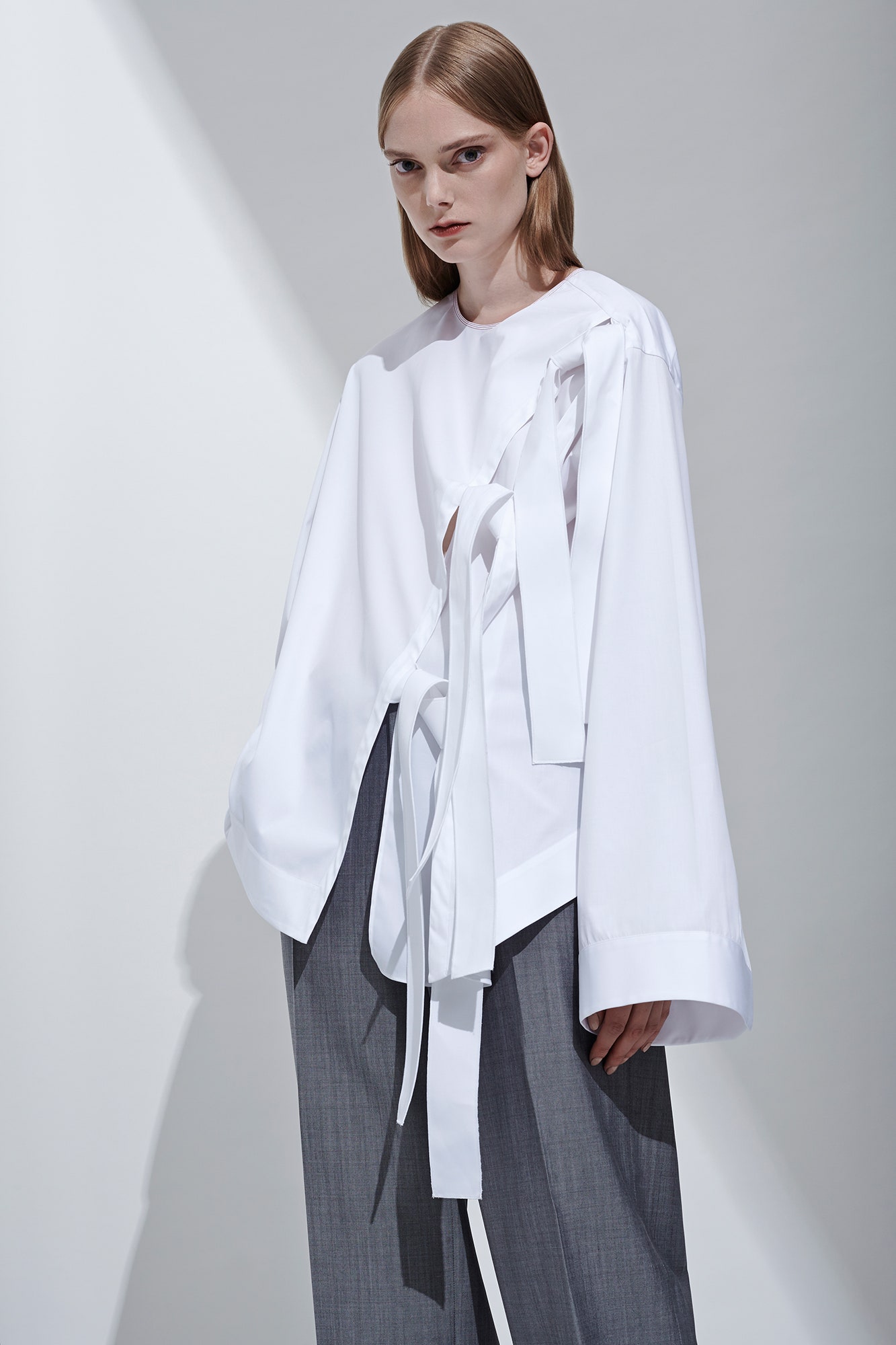 white cotton long-sleeve collared relaxed draped zippered shirt