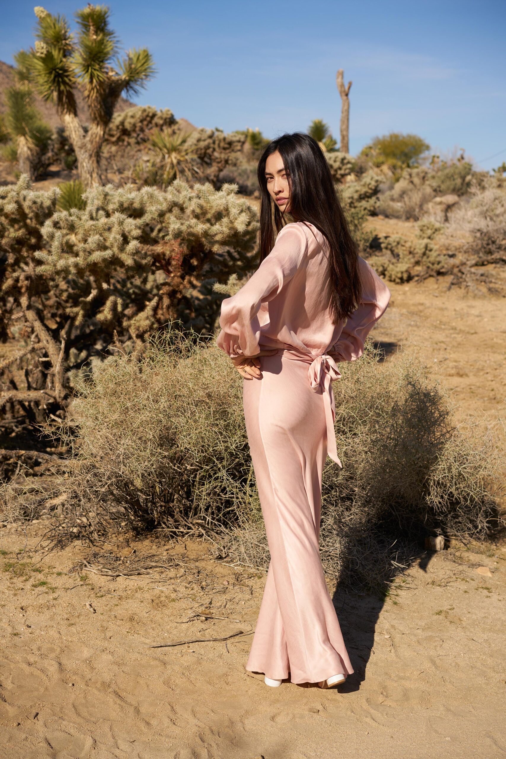 pink silk long-sleeve v-neck fitted draped top