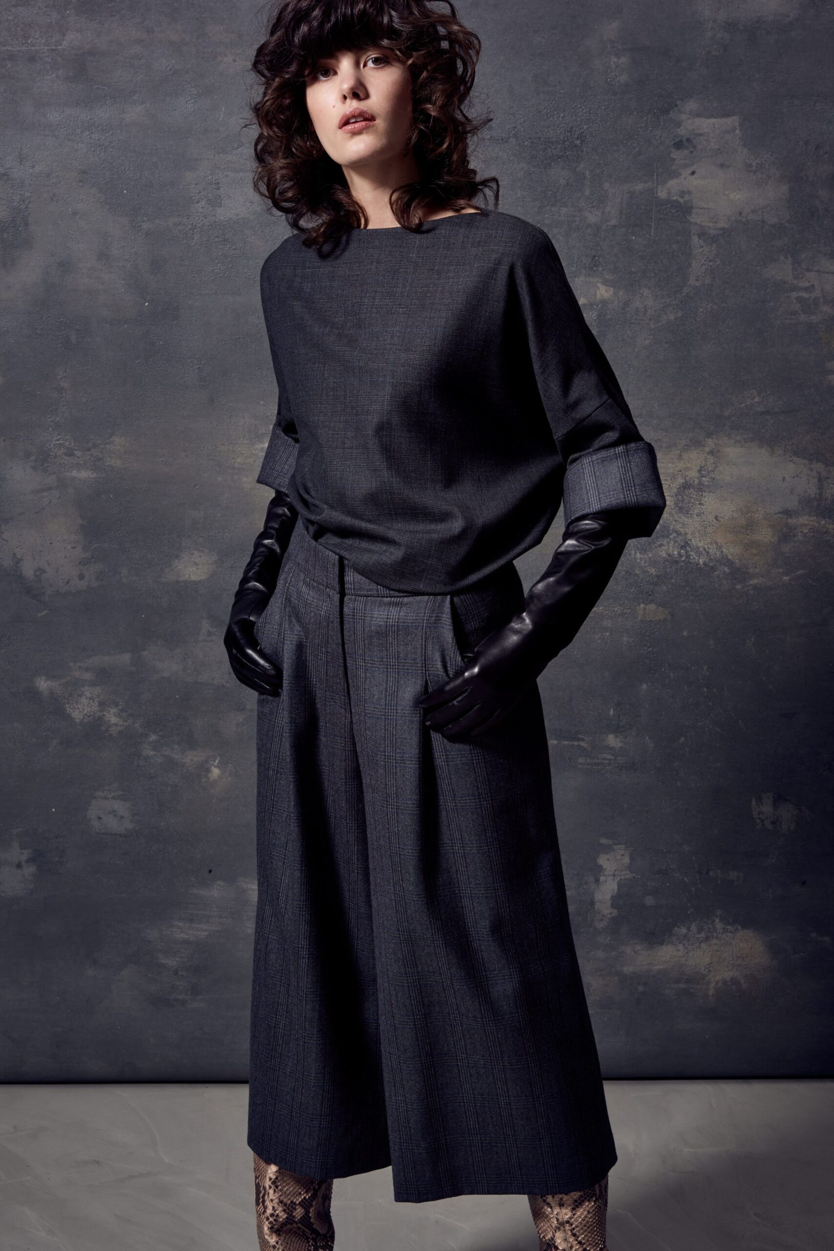 black relaxed top with tailored pants