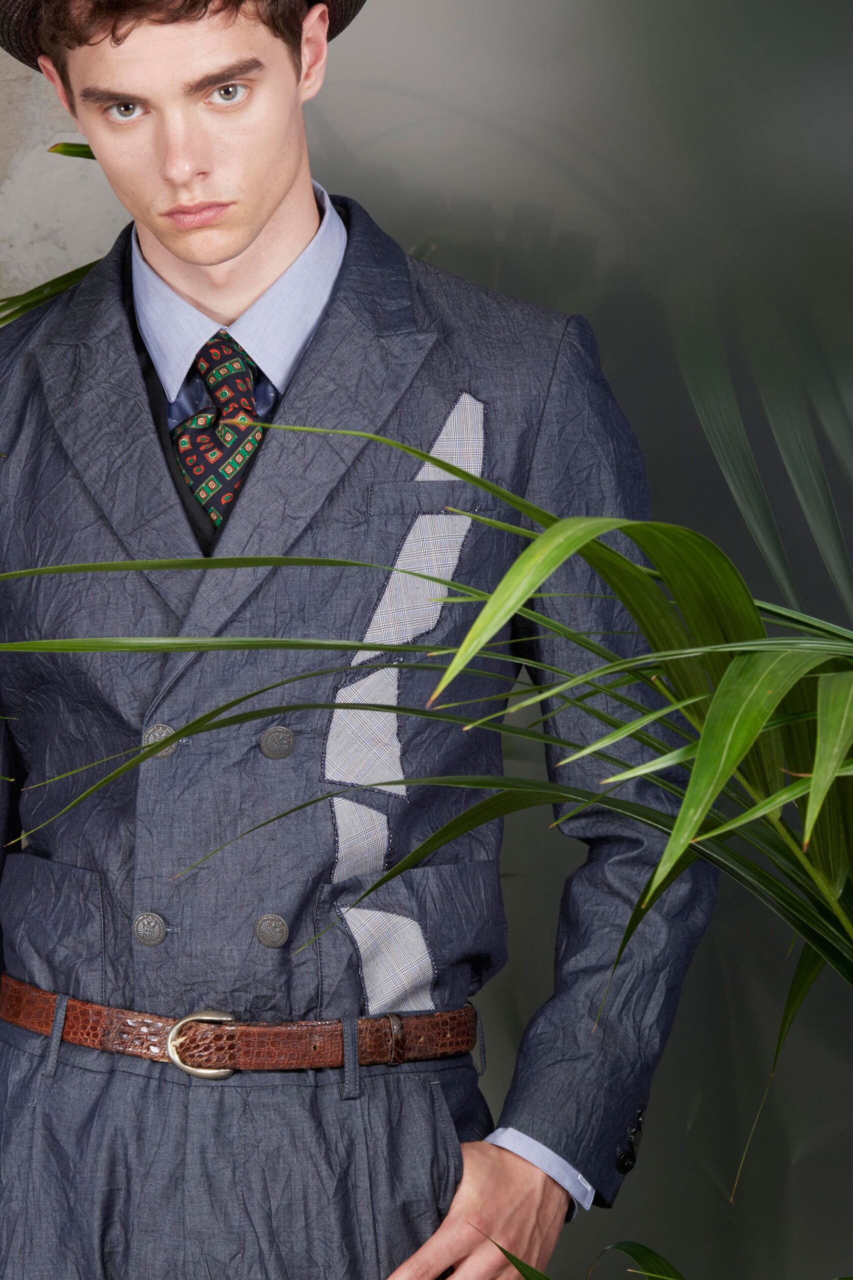 blue tailored suit with printed tie