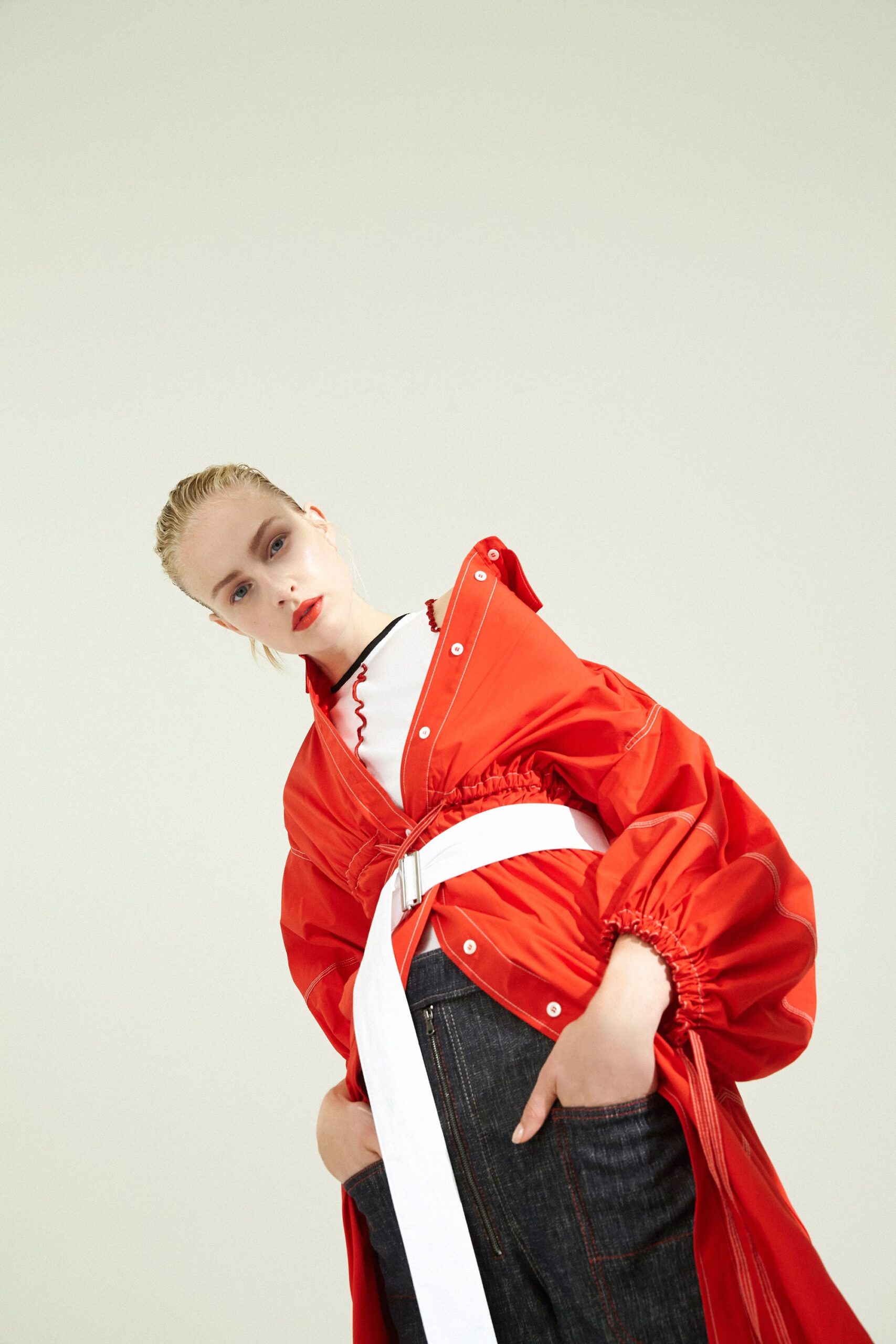 oversized red jacket with white belt