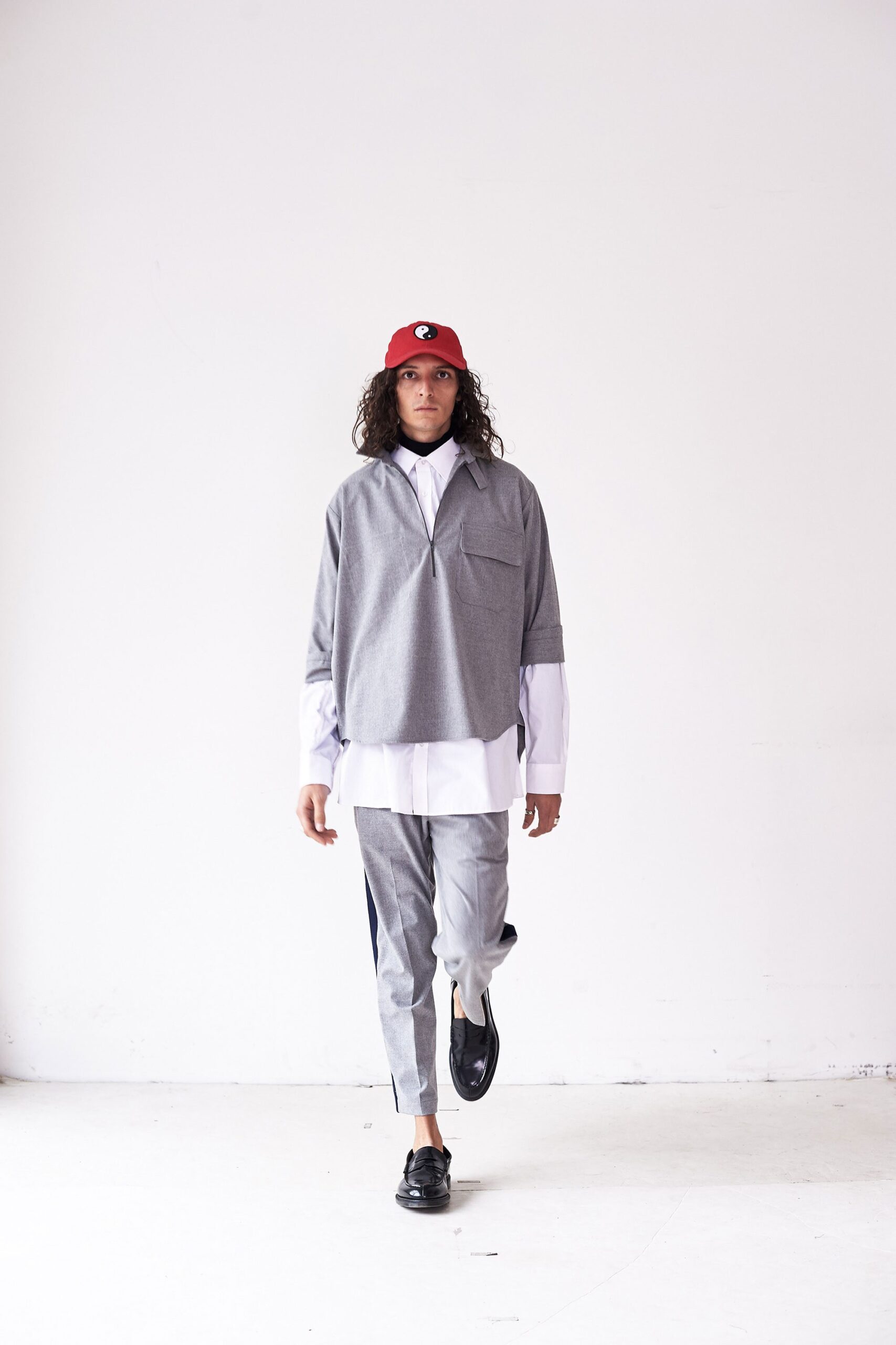 gray sleeveless high-neck relaxed zippered top