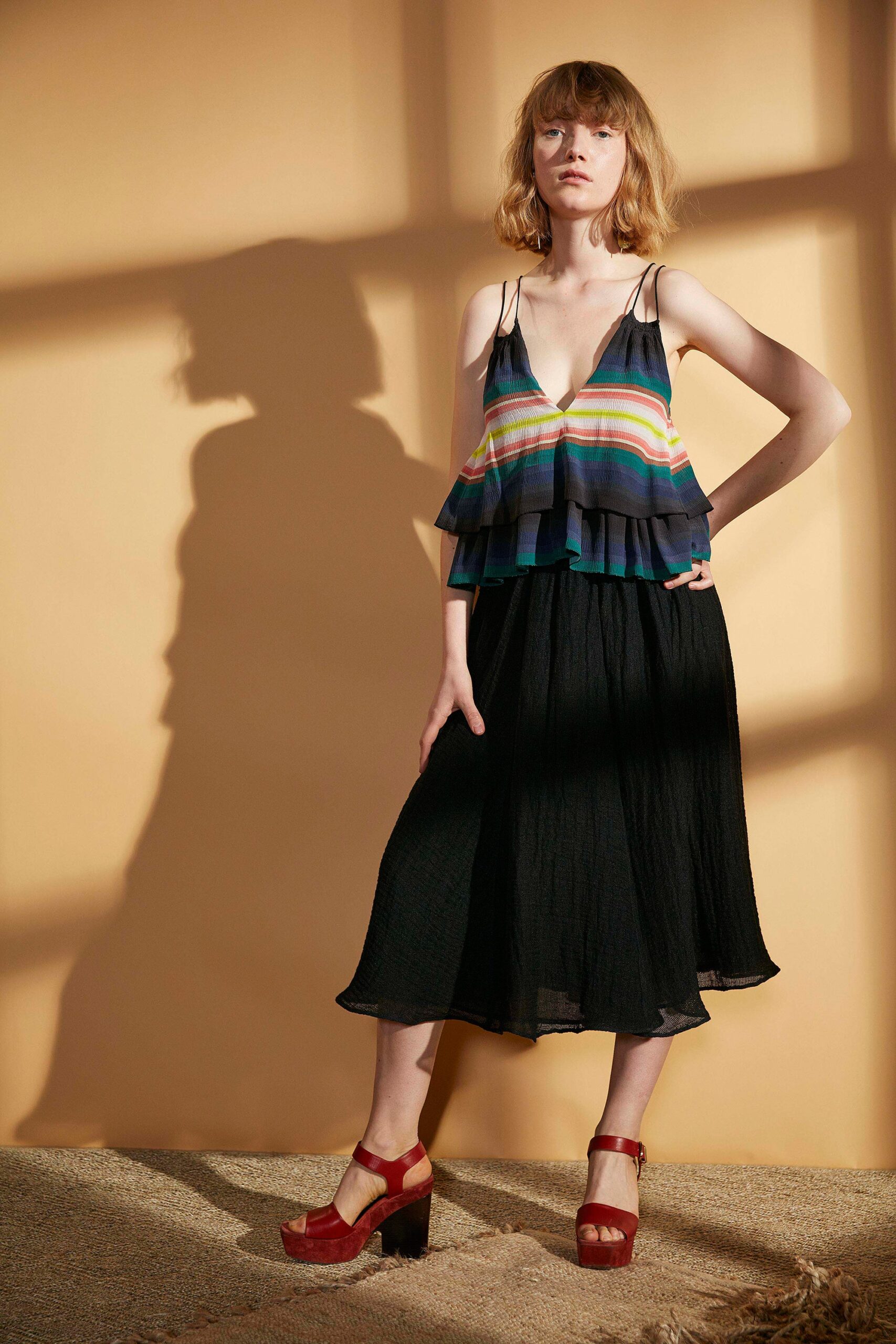 black chiffon sleeveless v-neck fitted ruffled top
